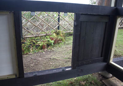 click to enlarge inset panel behind guest door